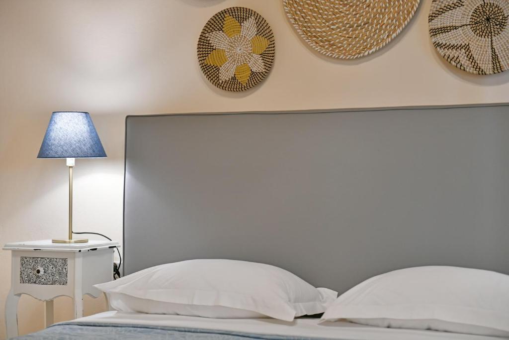 Postel nebo postele na pokoji v ubytování Athina Guesthouse
