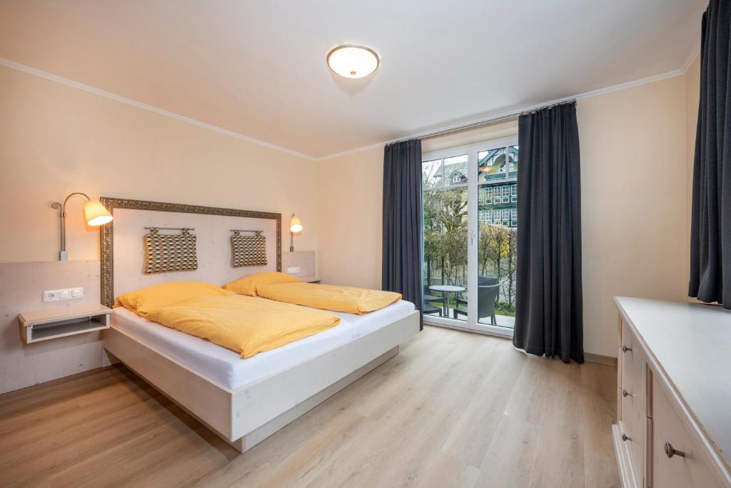 Posteľ alebo postele v izbe v ubytovaní Ziehrerhaus