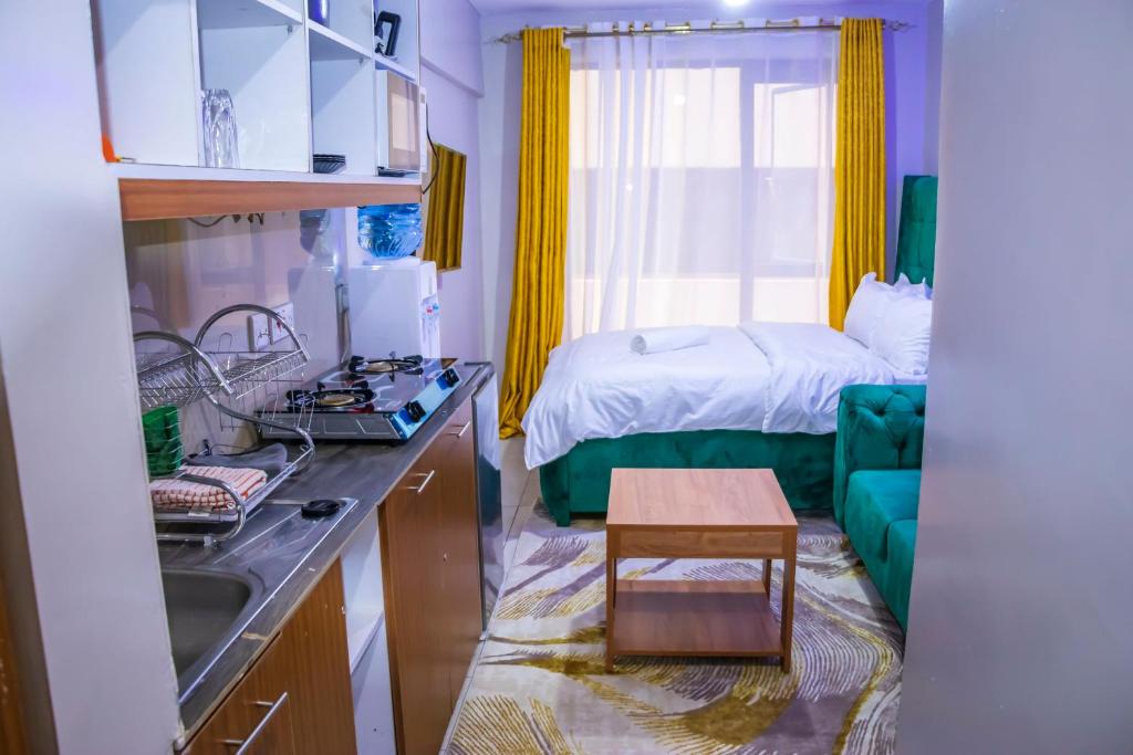 Kuchyň nebo kuchyňský kout v ubytování Golos STUDIO APARTMENT with swimming Pool