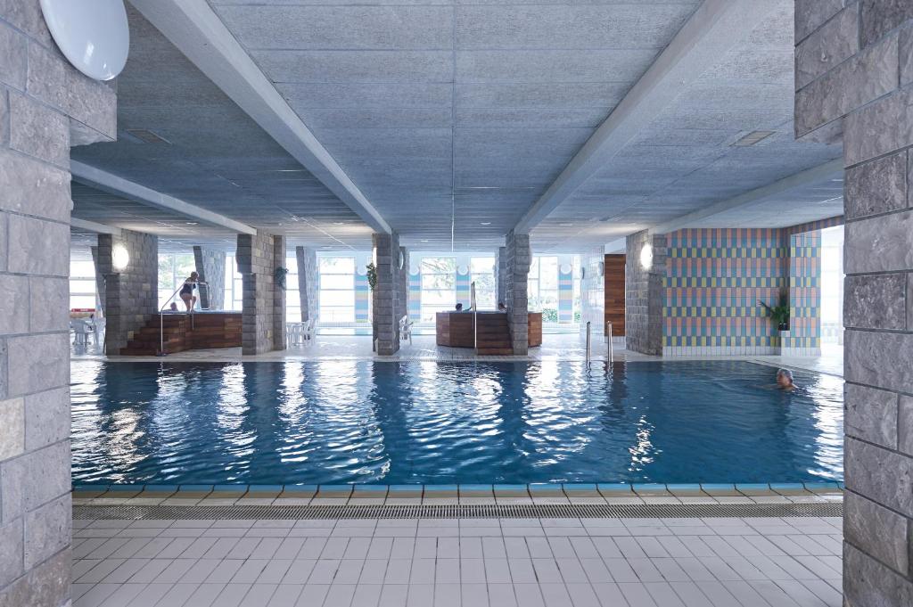 Bazén v ubytování Hotel Delfin nebo v jeho okolí