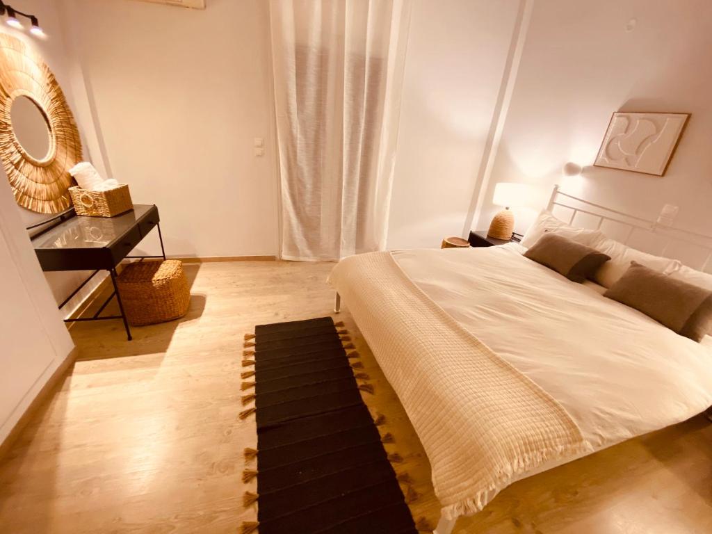 Postel nebo postele na pokoji v ubytování KIPOS-SS residences