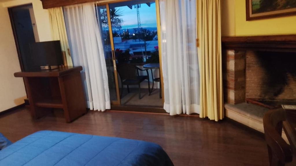 Postel nebo postele na pokoji v ubytování Casa de la Loma