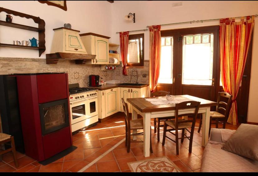 Kuchyň nebo kuchyňský kout v ubytování Villa Manca