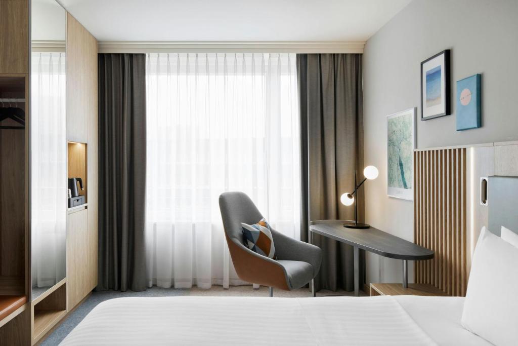 Postel nebo postele na pokoji v ubytování Courtyard by Marriott Zurich North