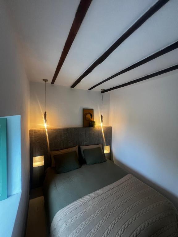 Ένα ή περισσότερα κρεβάτια σε δωμάτιο στο Casa Anjema boutique stay with infinity pool