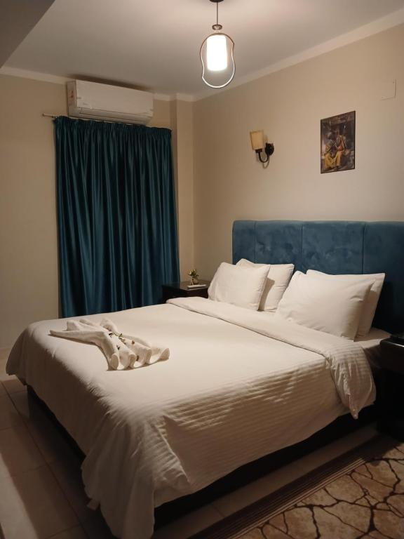 Postel nebo postele na pokoji v ubytování Pyramids Way Inn