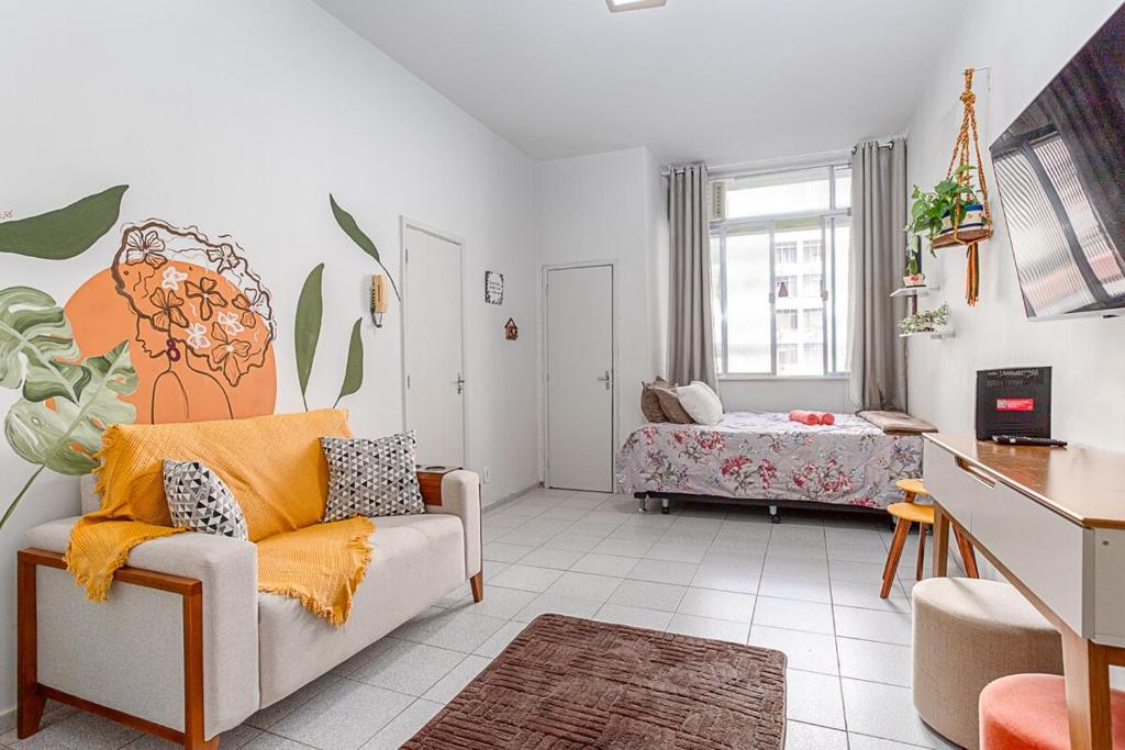 Ένα ή περισσότερα κρεβάτια σε δωμάτιο στο Studio no Flamengo - RJ