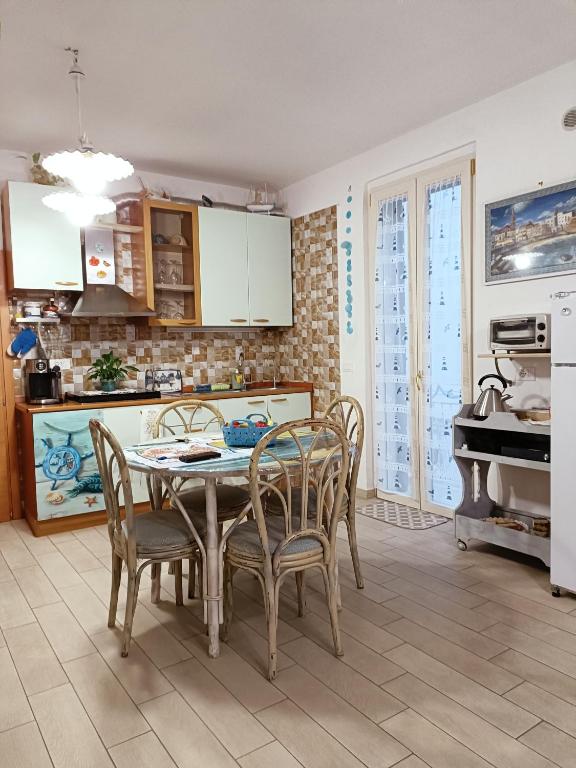 Kuchyň nebo kuchyňský kout v ubytování B&B U Mare Mio
