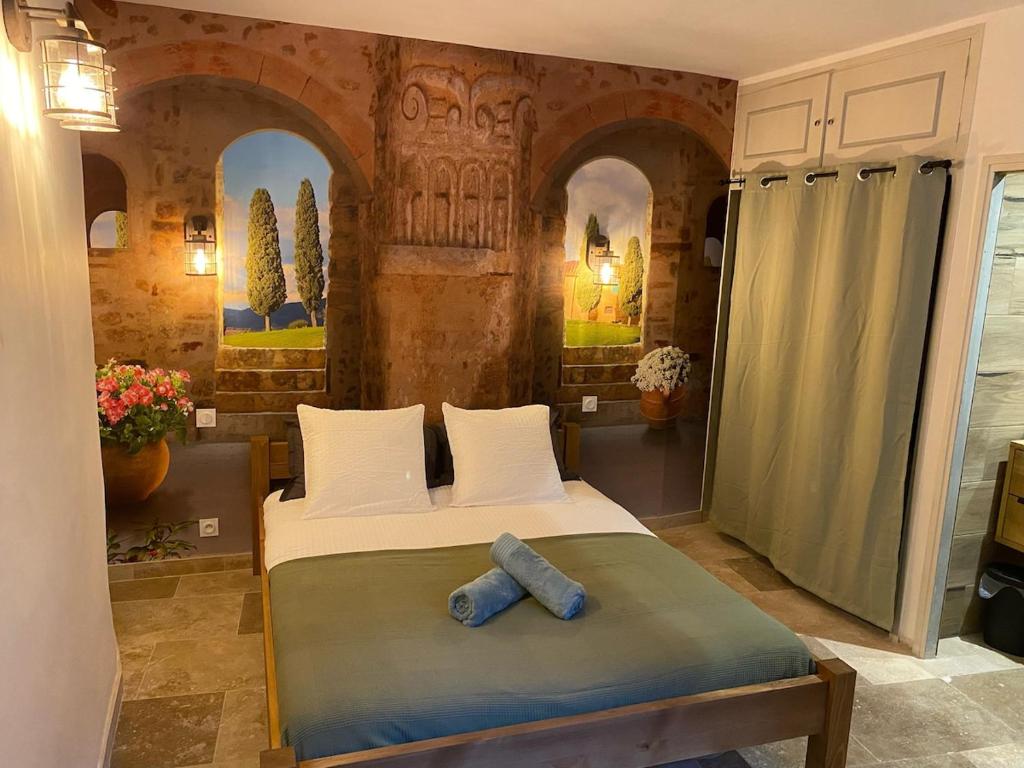 Postel nebo postele na pokoji v ubytování Le Clos des Papes