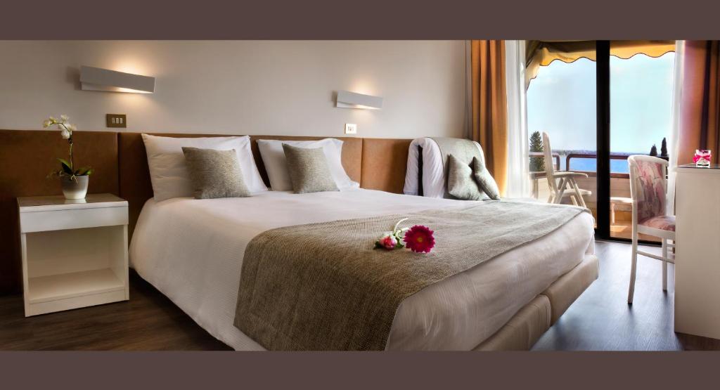 Postel nebo postele na pokoji v ubytování Hotel Désirée - Garda Lake Collection