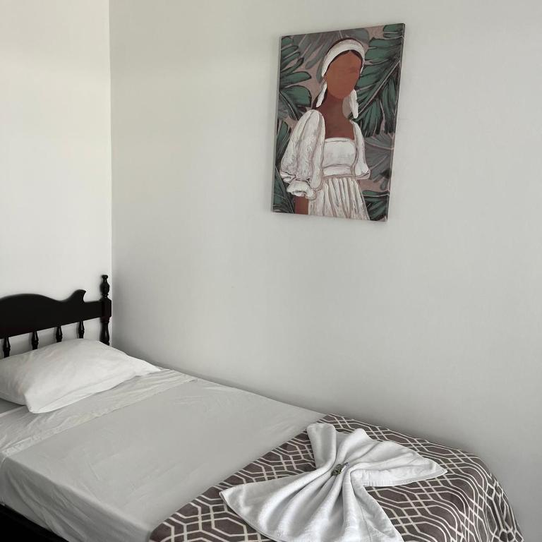 Postel nebo postele na pokoji v ubytování Hotel Naralit