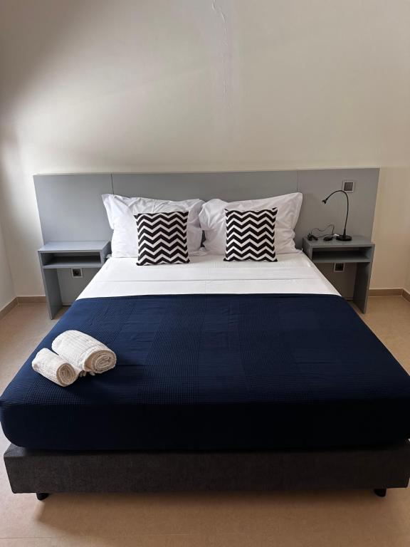 Postel nebo postele na pokoji v ubytování Claris B&B - Hostel