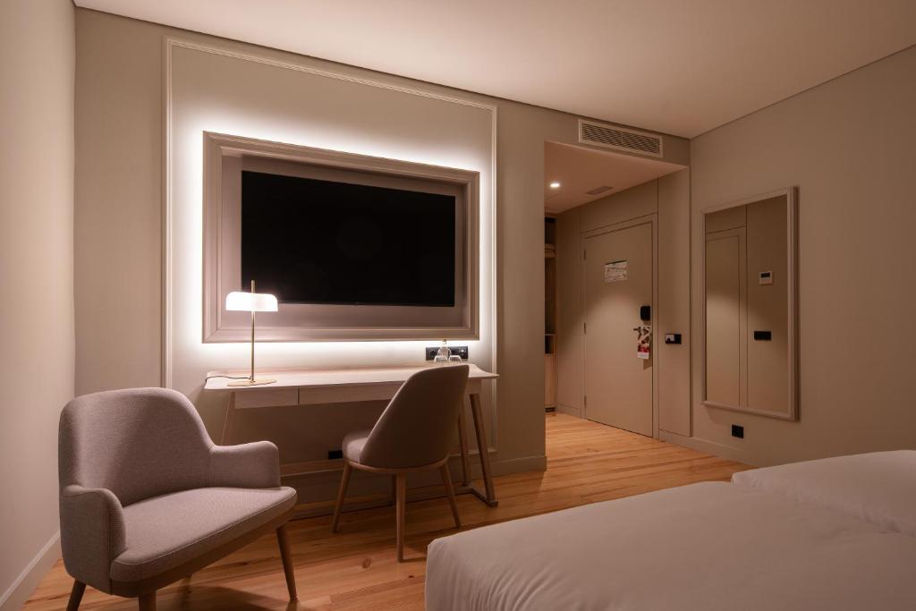 
Superior Room with One Double and Two Single Beds
