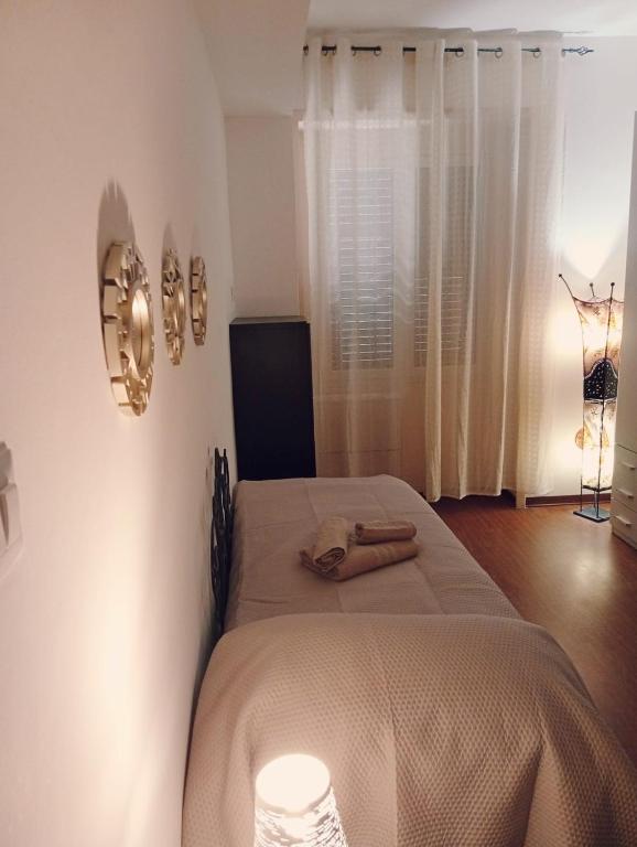 Postel nebo postele na pokoji v ubytování Trieste apartment