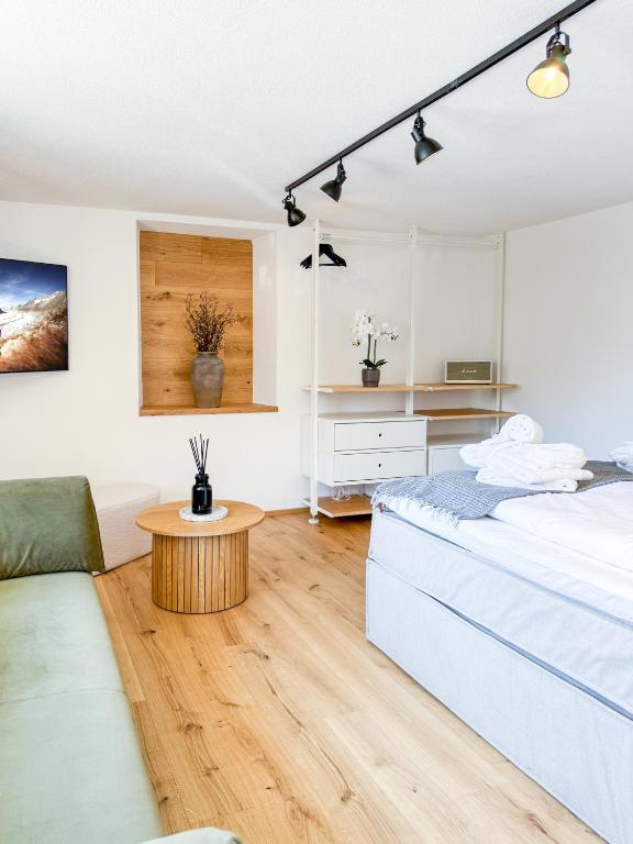 Postel nebo postele na pokoji v ubytování Zer Treichi Appartements