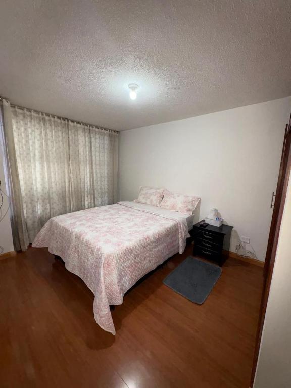 Postel nebo postele na pokoji v ubytování Hotel Dorado - Cerca al Aeropuerto - Habitación 202