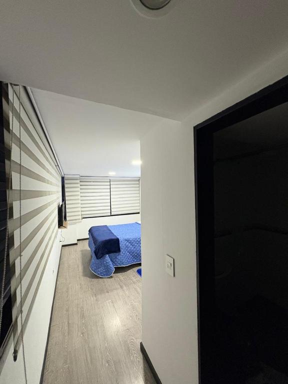 Postel nebo postele na pokoji v ubytování Hotel Dorado - Cerca al Aeropuerto - Habitación 401