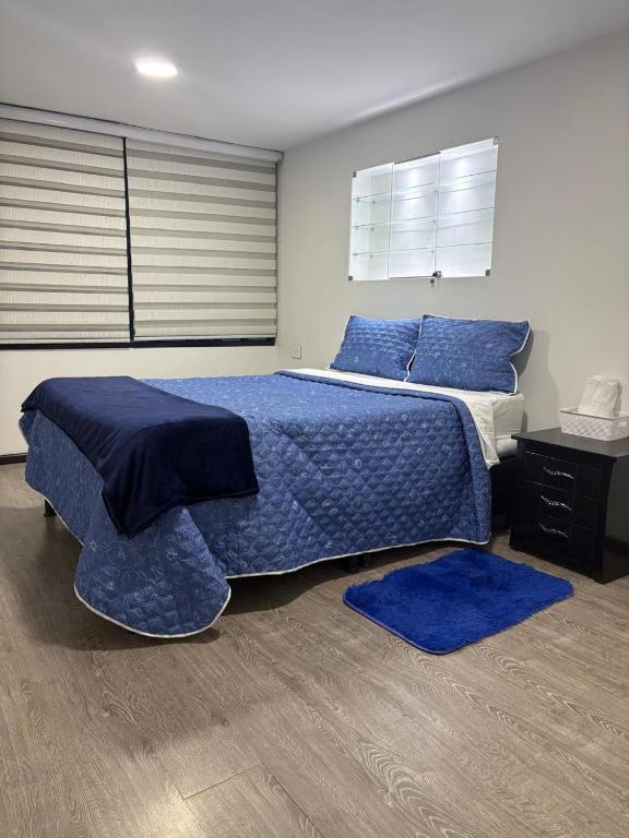 Postel nebo postele na pokoji v ubytování Hotel Dorado - Cerca al Aeropuerto - Habitación 401