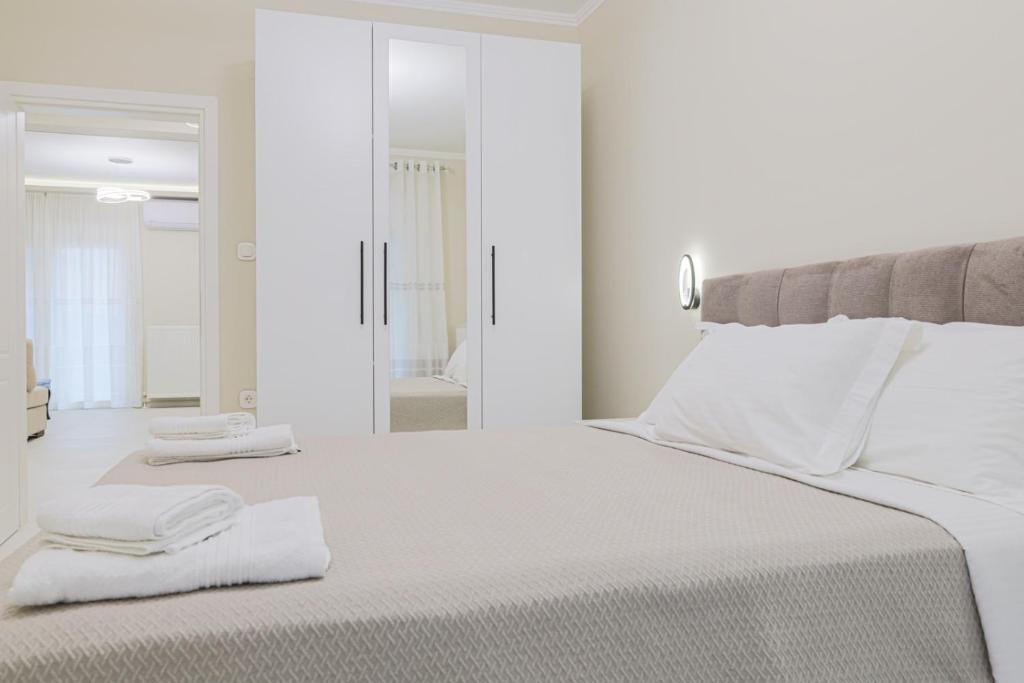 Postel nebo postele na pokoji v ubytování Mourati House