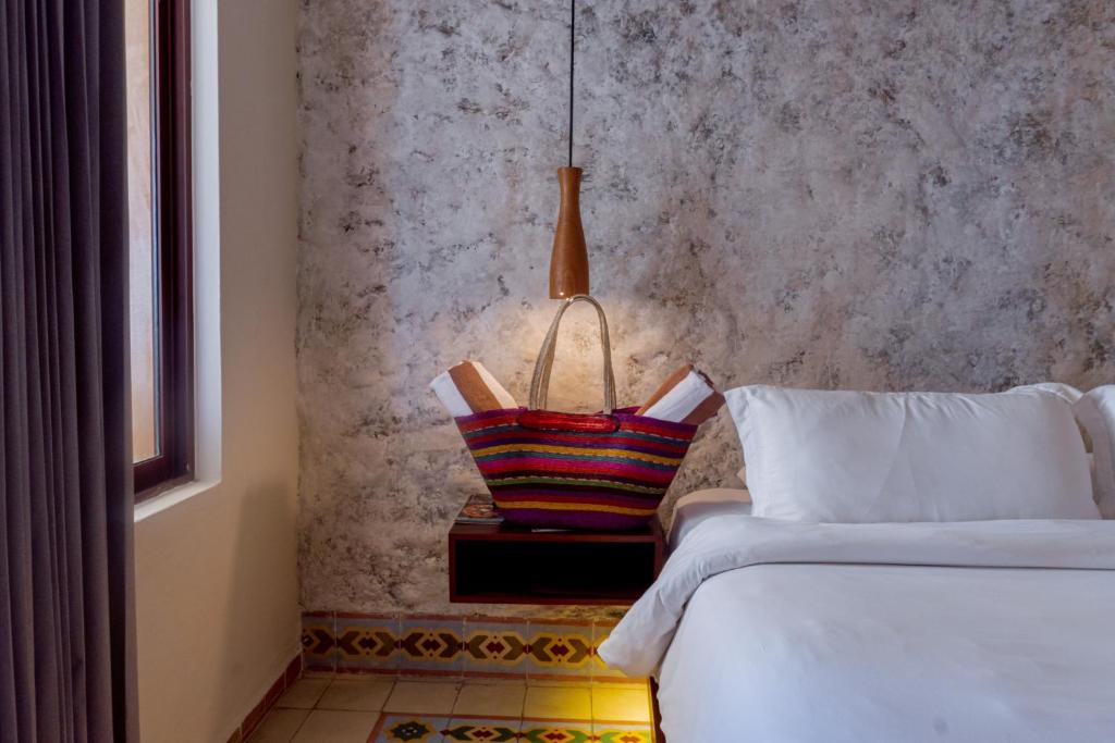 Postel nebo postele na pokoji v ubytování Hotel Scappata