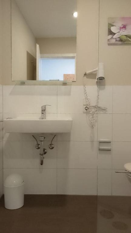 Koupelna v ubytování Hotel Zum Rebstock