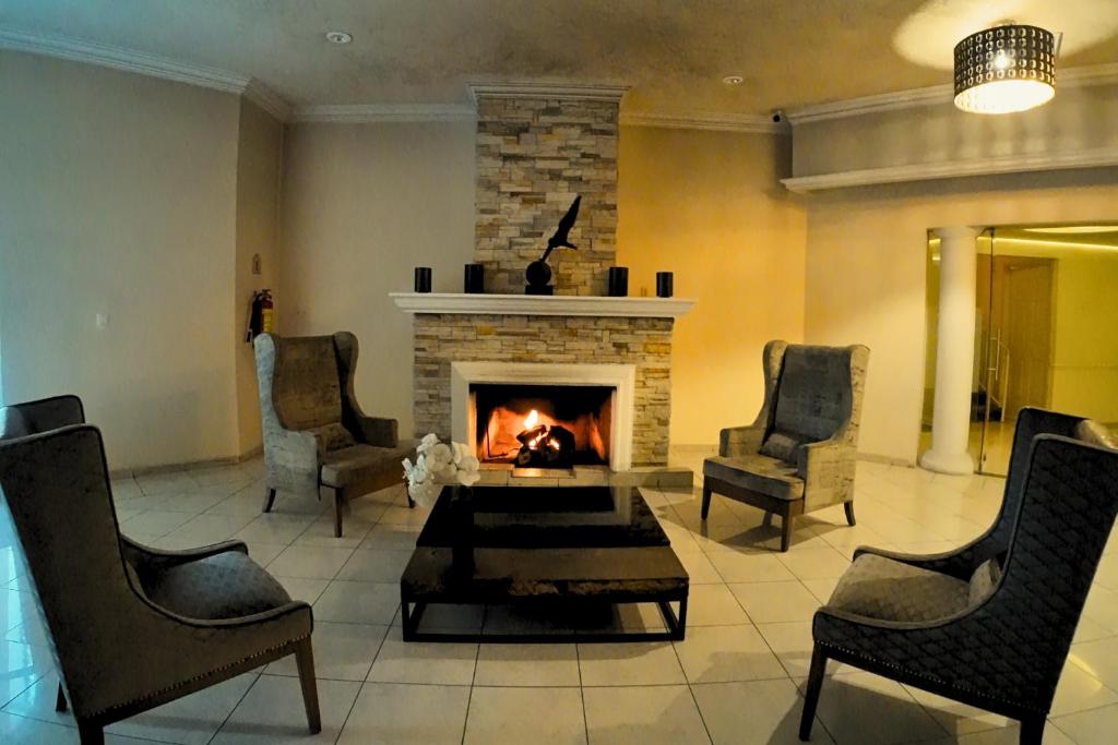 Posezení v ubytování Hotel Real del Bosque Golf and Spa