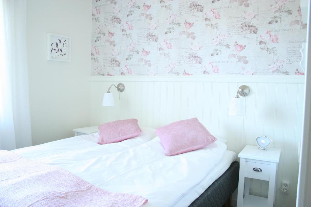 Postel nebo postele na pokoji v ubytování Nynäsgården Hotell & Konferens