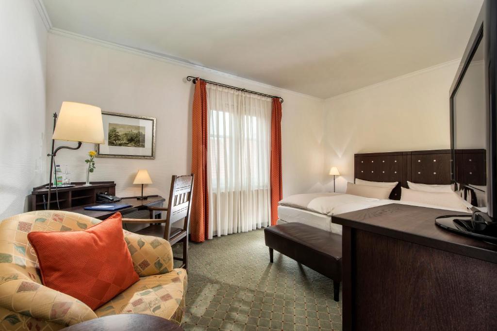 Postel nebo postele na pokoji v ubytování Best Western Soibelmanns Lutherstadt Wittenberg
