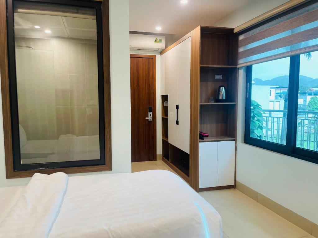Postel nebo postele na pokoji v ubytování Tam Coc Guest House One & Hotel Ninh Binh