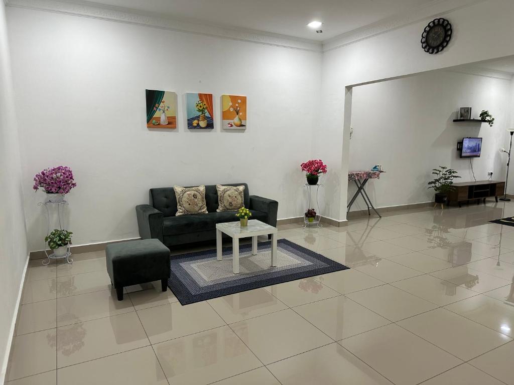 Posezení v ubytování Mummy Firdhan Homestay