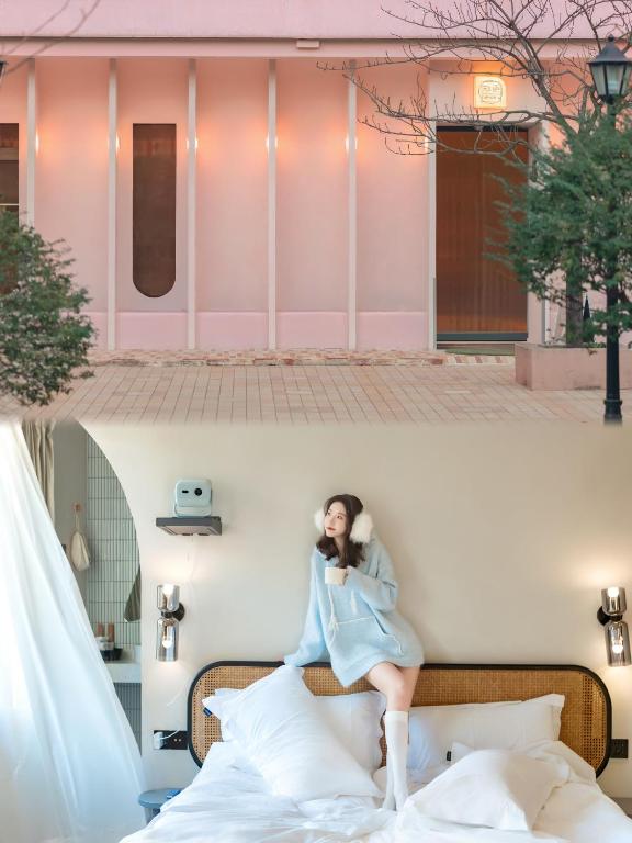 Postel nebo postele na pokoji v ubytování EUPHORIA丨Quiet Garden Quiet Designer Garden Hotel丨Datang Never Sleeps City Big Wild Goose Pagoda Subway Station Branch丨Near the scenic area