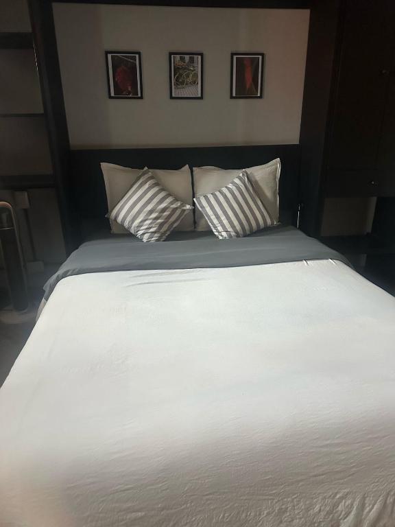 Postel nebo postele na pokoji v ubytování Suites Santa Noche & Spa