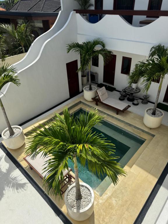 Bazén v ubytování Uluwatu Stay's Standard Room #4 nebo v jeho okolí