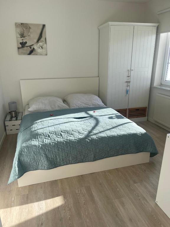 Postel nebo postele na pokoji v ubytování Küstenbude Seestern