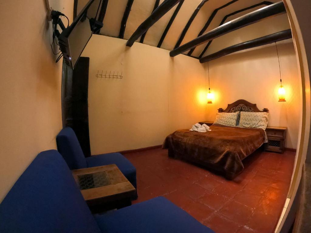 Postel nebo postele na pokoji v ubytování Ulucaho Hostel