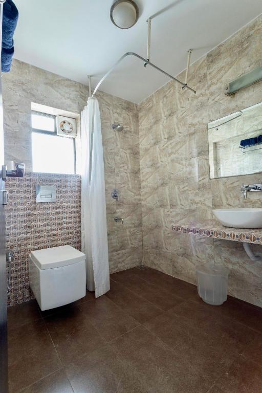 Koupelna v ubytování Arotel Rooms & Suites Calangute