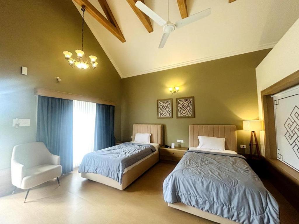 Postel nebo postele na pokoji v ubytování TVR resort - Luxury Villas With Bathtub and Pool