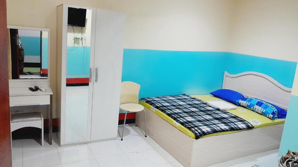 Postel nebo postele na pokoji v ubytování S I Guesthouse
