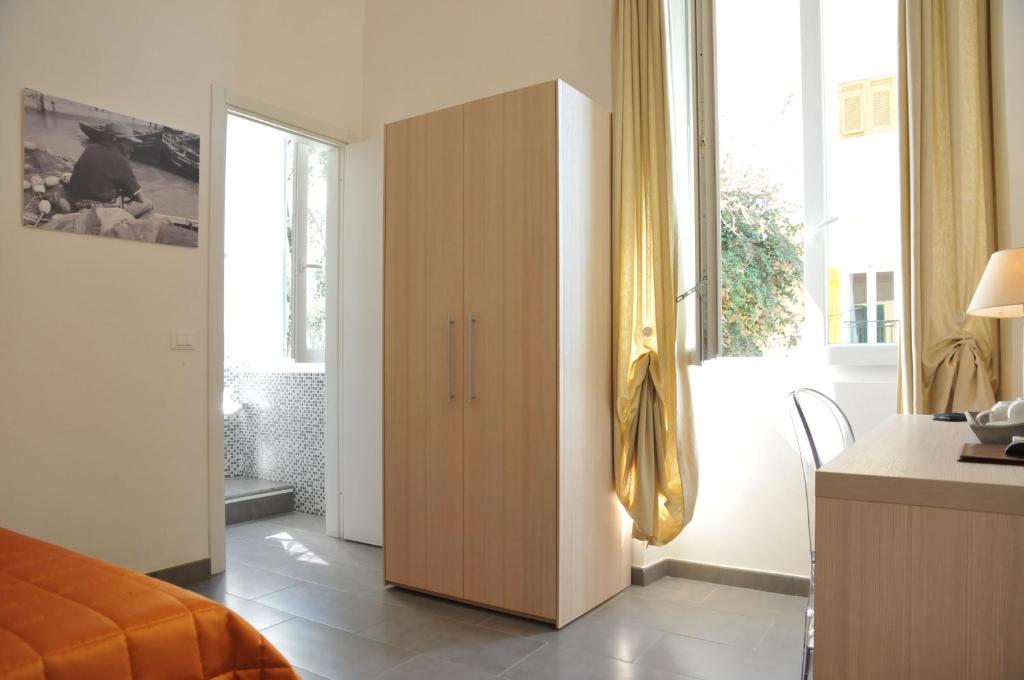 A bed or beds in a room at Affittacamere Da Flo
