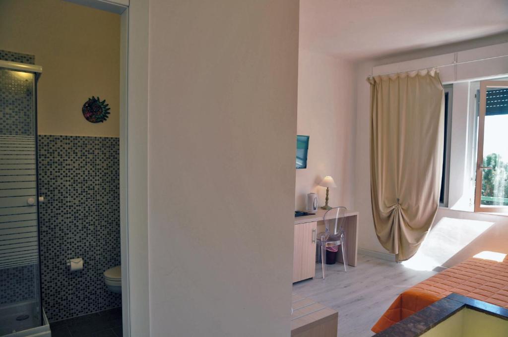 A bed or beds in a room at Affittacamere Da Flo