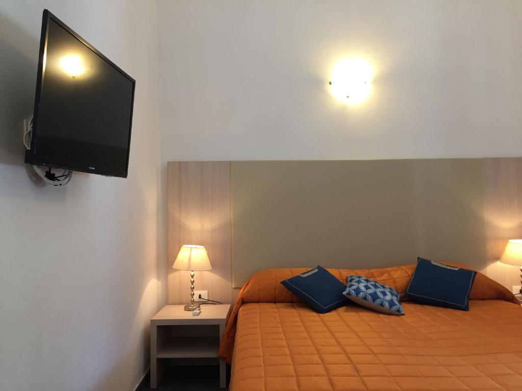 A bed or beds in a room at Affittacamere Da Flo