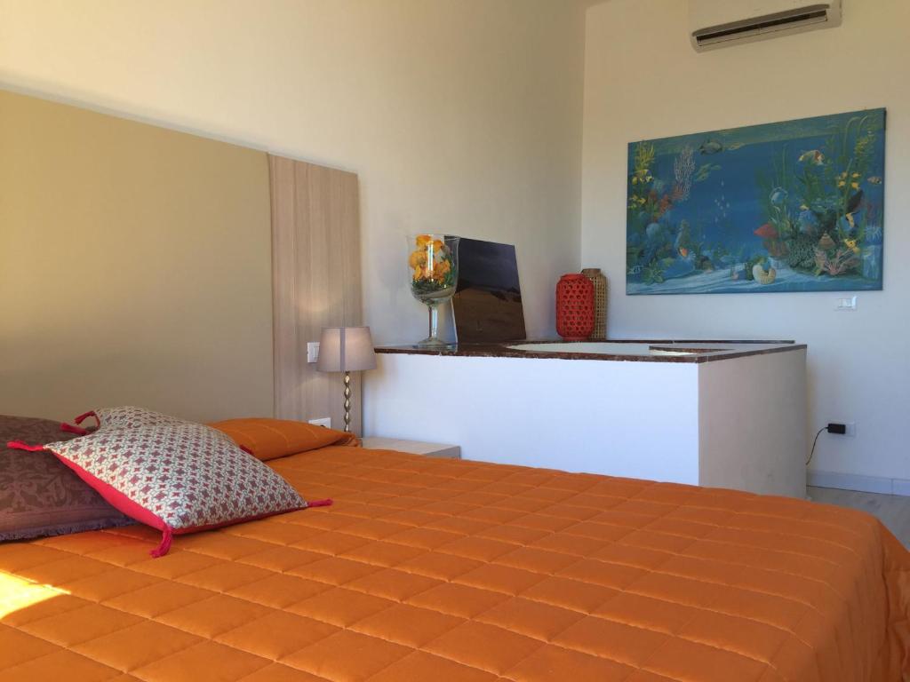 A bed or beds in a room at Affittacamere Da Flo