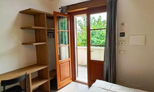 A bed or beds in a room at Ca`Rosei