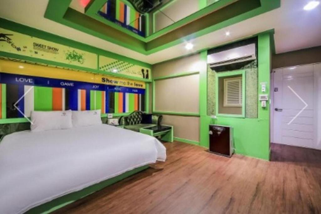 Postel nebo postele na pokoji v ubytování Show Hotel Haeundae
