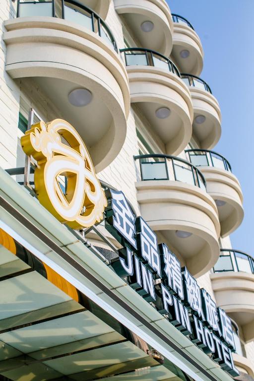 Certifikát, hodnocení, plakát nebo jiný dokument vystavený v ubytování Jin Pin Hotel