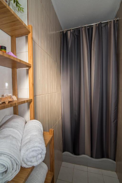 Postel nebo postele na pokoji v ubytování Dekem Residence