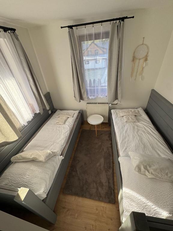 Postel nebo postele na pokoji v ubytování Ubytování pod Rozhlednou