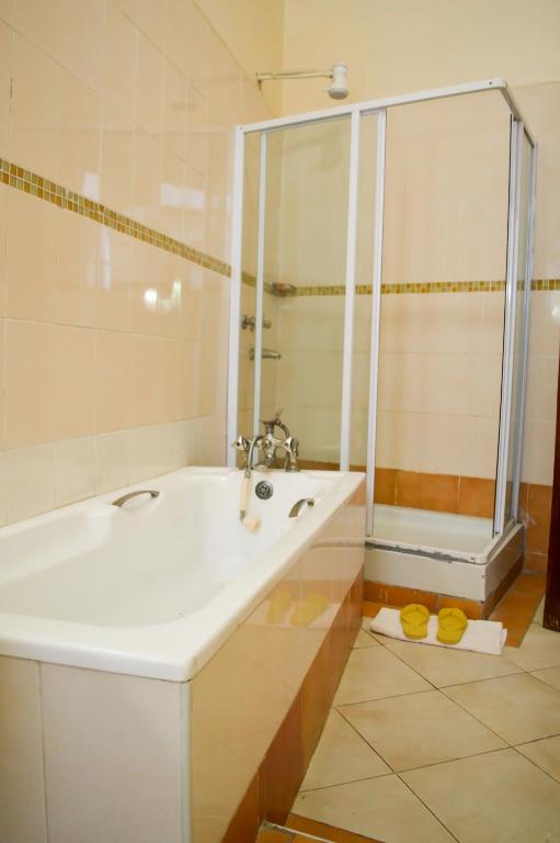 Koupelna v ubytování Anthena Hotel