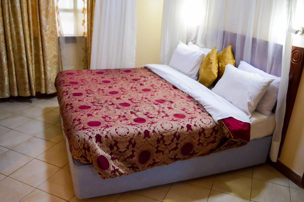 Postel nebo postele na pokoji v ubytování Anthena Hotel