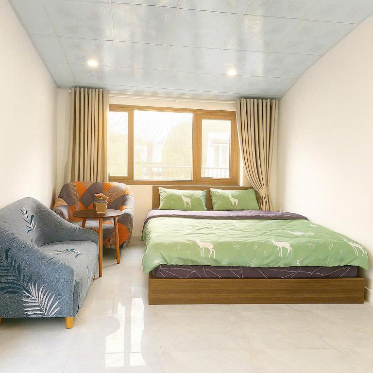 Postel nebo postele na pokoji v ubytování Villa Đà Lạt - TTH1